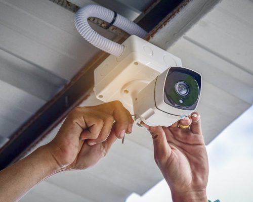 Technician-installing-CCTV-Camera